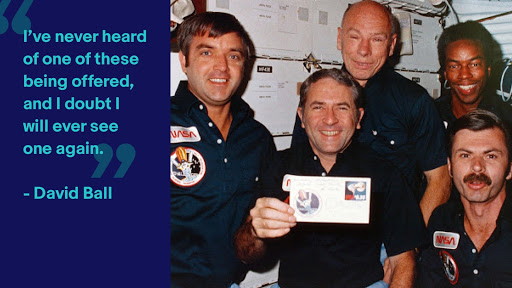 The crew of the STS 8 mission on the shuttle in 1983 with Richard Truly holding the stamp cover. Image credit to NASA